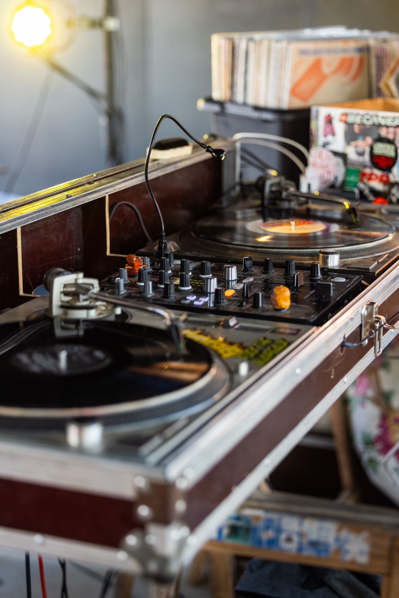 Turntables and record crates set up before the night session